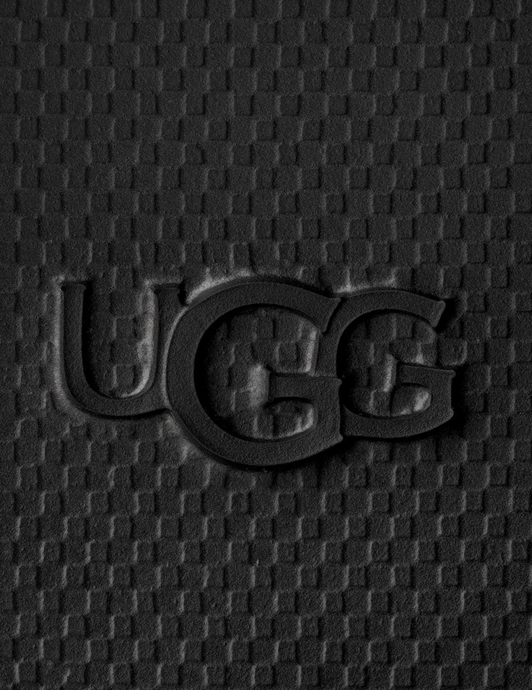 Sandalias UGG GoldenGlow Slide negras de mujer